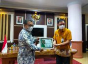 Piagam UHC BPJS Kesehatan Jadi Kado Terakhir Bupati Arhawi